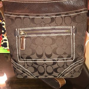Brown coach pocketbook. Barely used it